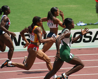 Women runners in the 100 meter dash.